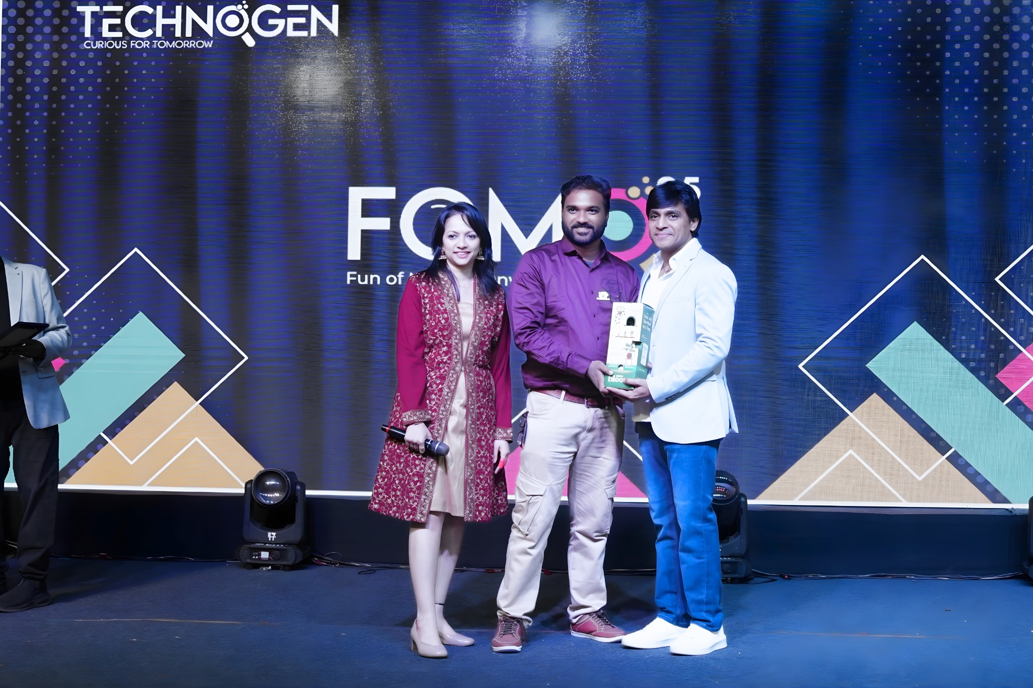 Award presented to the Candid Treasures Photography team